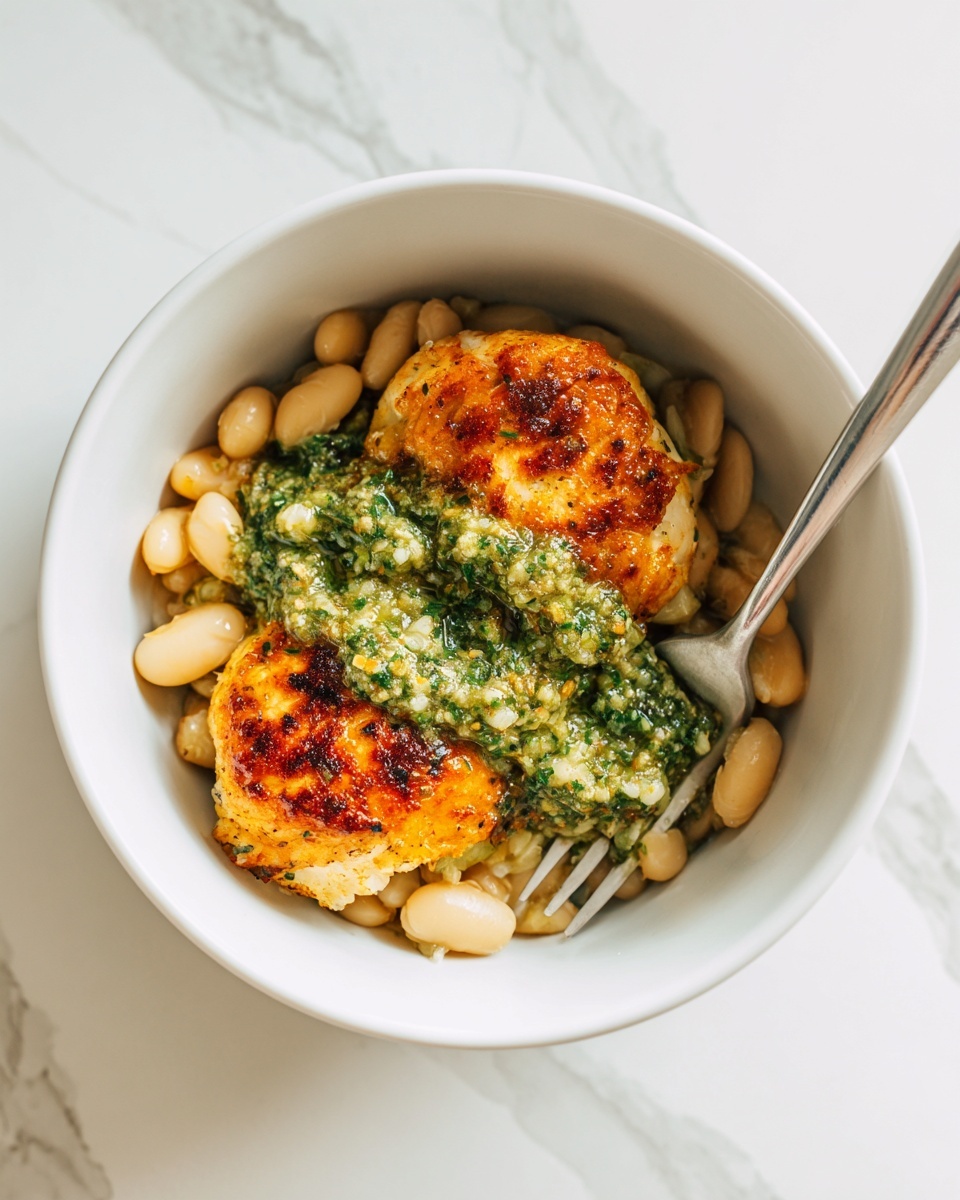 One-Pan Crispy Chicken with Cannellini Beans and Pistachio Pesto Recipe - Recipe Image