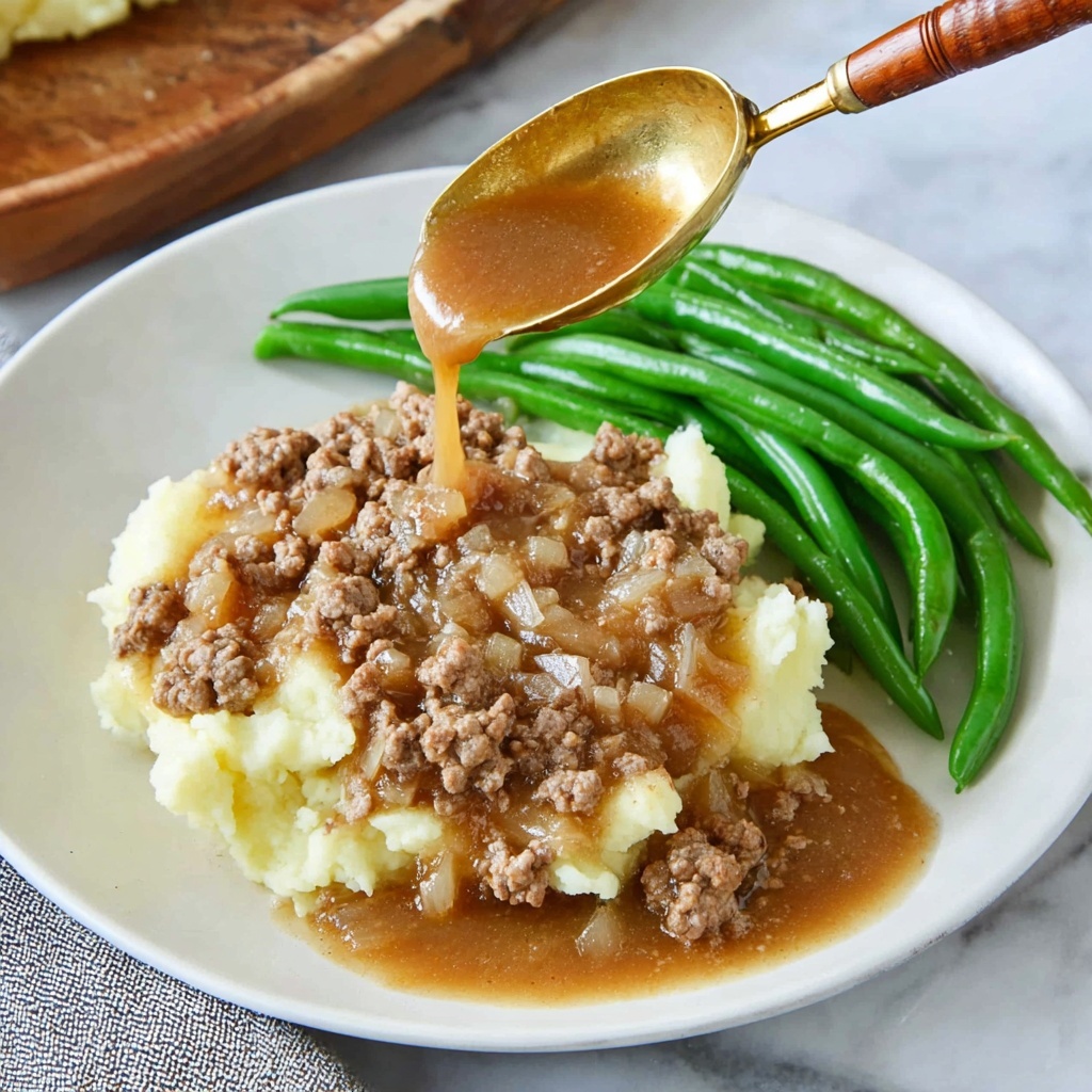 Ground Beef and Gravy Over Mashed Potatoes Recipe - Recipe Image