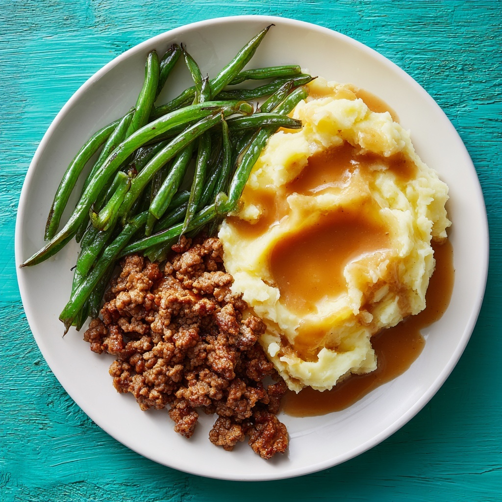 Garlic Butter Steak Bites with Mashed Potatoes and Green Beans Recipe - Recipe Image