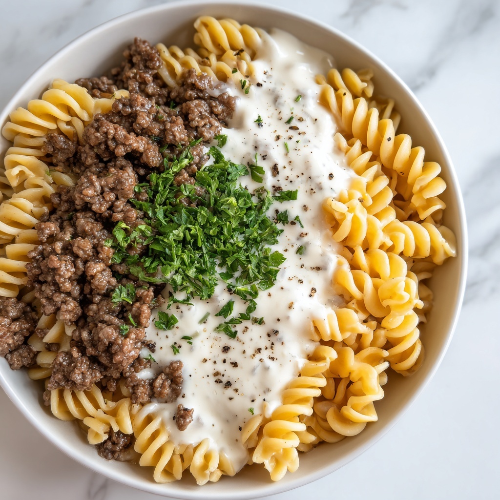 Beef and Rotini in Garlic Parmesan Sauce Recipe - Recipe Image