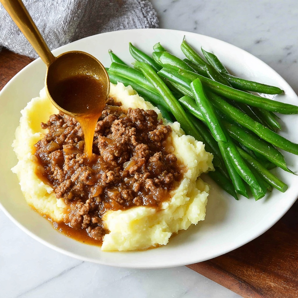 Ground Beef and Gravy Over Mashed Potatoes Recipe - Recipe Image