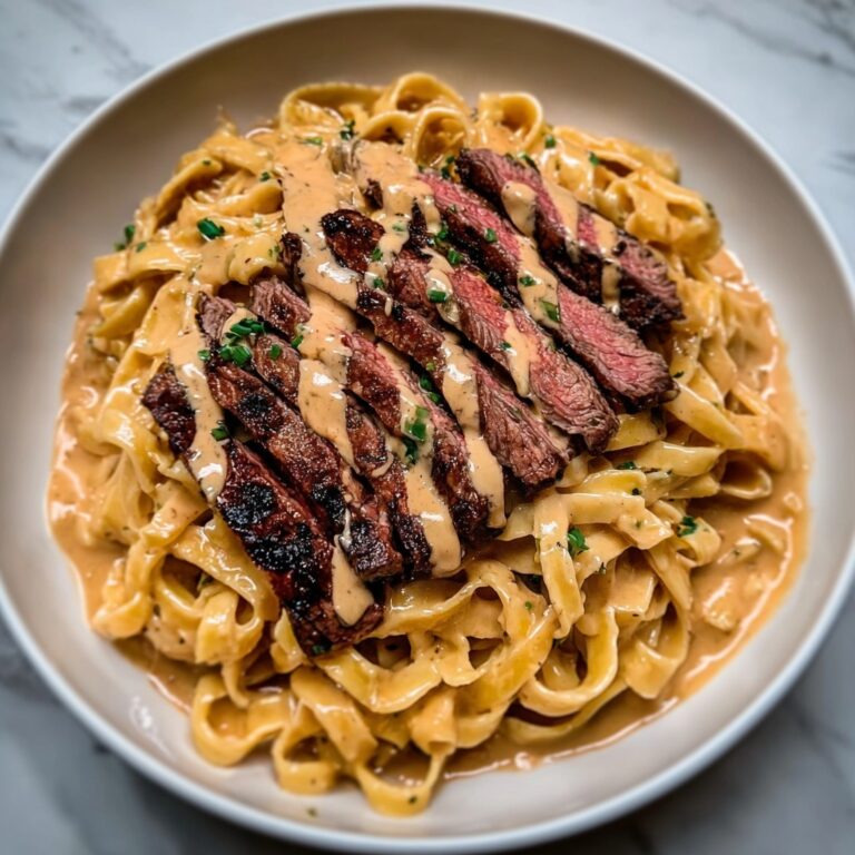 Spicy Cajun Steak with Creamy Alfredo Pasta Recipe