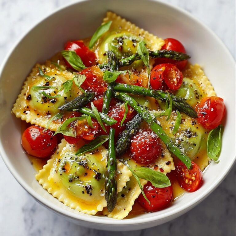 Ravioli with Cherry Tomatoes, Asparagus, Garlic, and Fresh Herbs Recipe