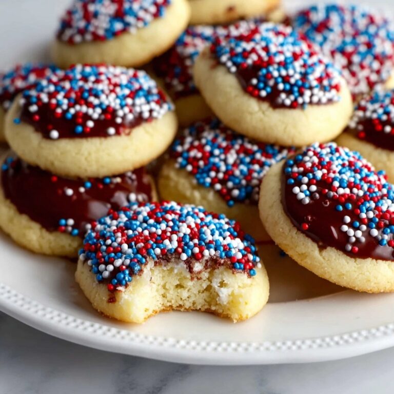 Shortbread Thumbprint Cookies with Chocolate Footballs and Laces Recipe