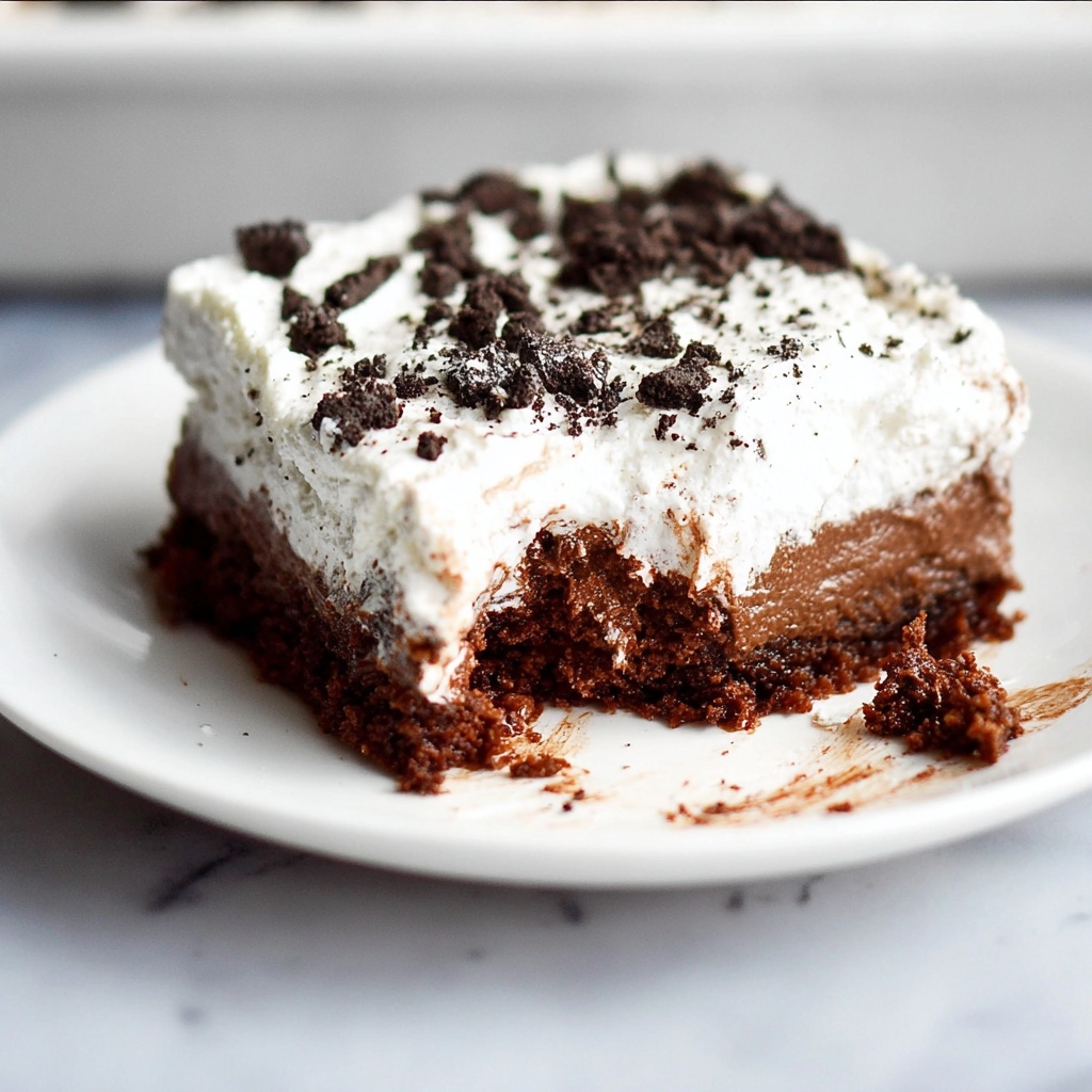 Oreo Pudding Poke Cake Recipe - Recipe Image